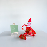 Elf Gift Wrapping Scene